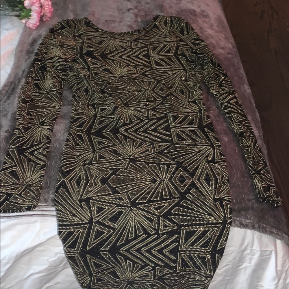 Black and gold back out body con dress